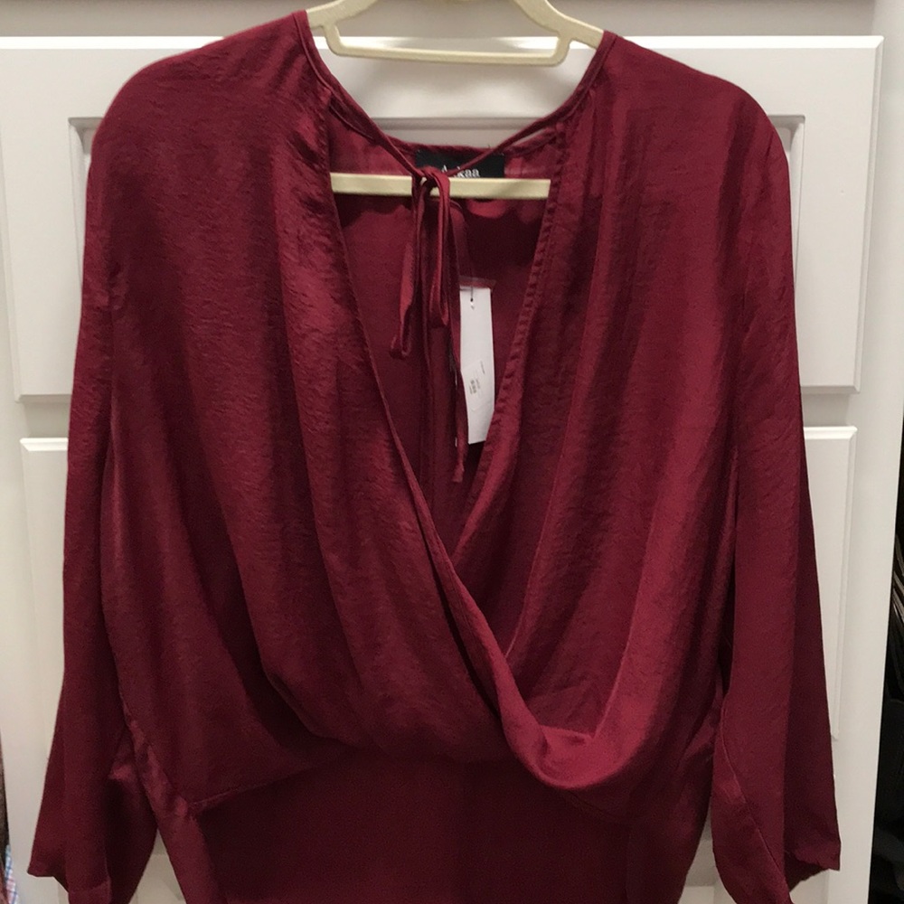 Maroon top. NWT